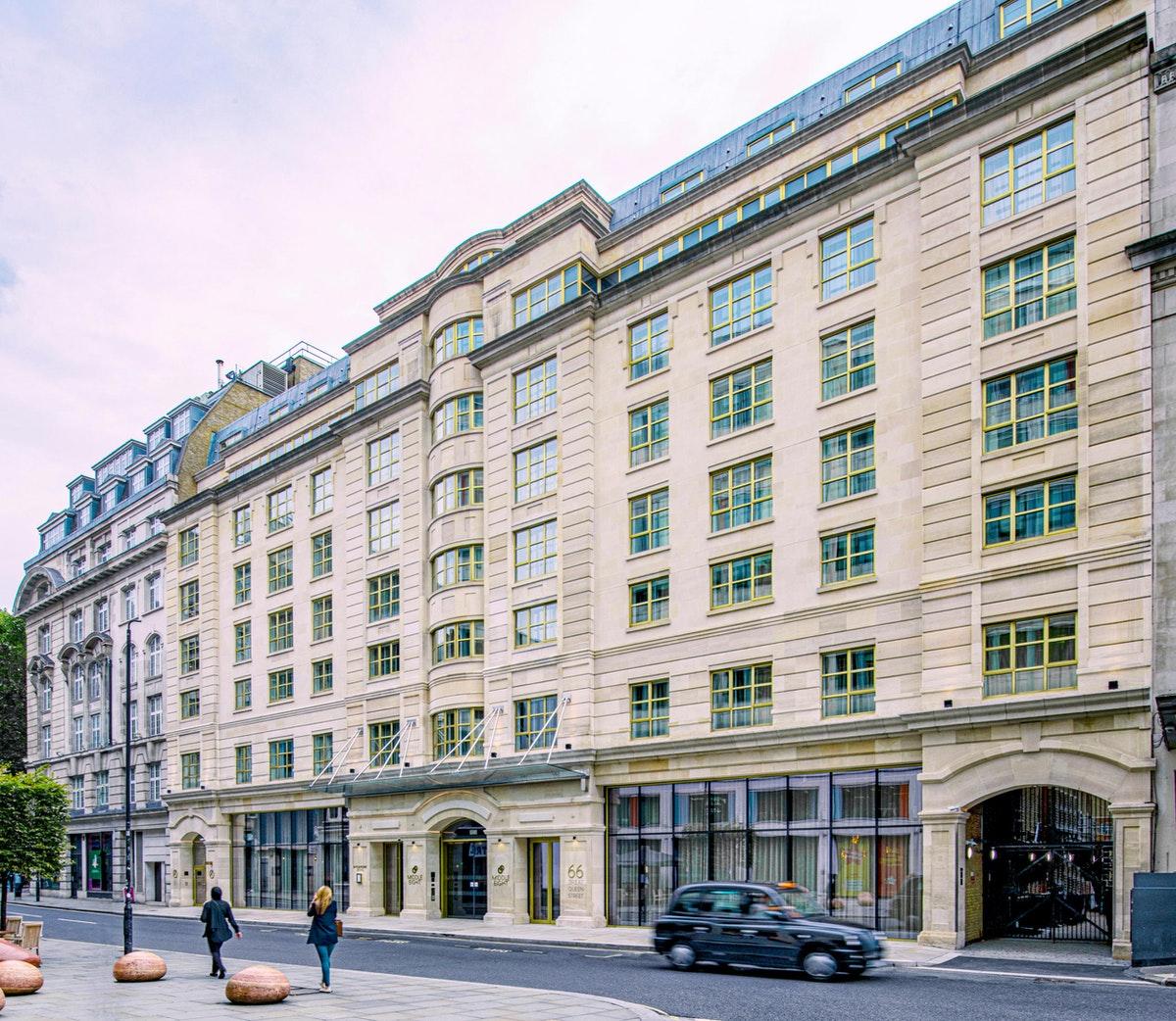 Middle Eight - Covent Garden - Preferred Hotels And Resorts London Bagian luar foto The photo shows a large, multi-story building with a classical architectural style. The facade features a mix of light-colored stone and large windows, giving it a sophisticated appearance. The building has several levels with prominent horizontal li